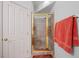 Bathroom displaying gold accented shower with matching gold fixtures and towel at 1105 Malachite Ct, Henderson, NV 89011