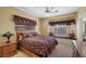 Cozy bedroom features large window seat, neutral walls, and carpeted flooring at 1105 Malachite Ct, Henderson, NV 89011