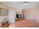 Comfortable bedroom featuring decorative wall accents and a TV at 1105 Malachite Ct, Henderson, NV 89011