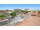 A rooftop terrace with mountain views and a white railing provides an inviting space to enjoy the outdoors at 1105 Malachite Ct, Henderson, NV 89011