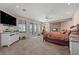 Large main bedroom features a fireplace, ceiling fan, and French doors to a balcony at 1105 Malachite Ct, Henderson, NV 89011