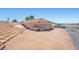 Spacious rooftop deck, partially furnished with seating, offering panoramic views of the surrounding neighborhood at 1105 Malachite Ct, Henderson, NV 89011