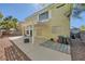 Backyard showcasing a large patio perfect for gatherings, shade structure, and desert landscaping at 1116 Avellino Ln, Las Vegas, NV 89144