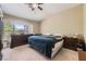Cozy bedroom with a window providing natural light and closet for storage at 1116 Avellino Ln, Las Vegas, NV 89144