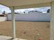 Spacious backyard featuring gravel ground cover and block wall offering privacy at 129 Maple St, Henderson, NV 89015