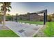 Community driving range featuring multiple bays and hillside view at 15 Reflection Bay Dr, Henderson, NV 89011