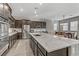 Spacious kitchen with stainless steel appliances and a large island at 15 Reflection Bay Dr, Henderson, NV 89011