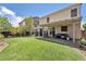 Large backyard featuring a pergola, patio, and well-manicured artificial grass, perfect for outdoor enjoyment at 184 Bird Cove Ave, Henderson, NV 89011