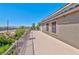 A serene balcony with desert views, stucco columns, and secure railings for relaxing outdoor living at 201 Palmarosa St, Henderson, NV 89015