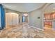 Spacious foyer featuring decorative tile flooring, arched doorways, and views into other living spaces at 201 Palmarosa St, Henderson, NV 89015
