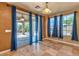 Sunlit room with a view of the patio and the pool at 201 Palmarosa St, Henderson, NV 89015