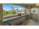 Balcony showcasing view of community, tiled counter and outdoor seating at 2050 W Warm Springs Rd # 823, Henderson, NV 89014