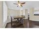 Dining space featuring wood floors, a modern ceiling fan, and ample natural light at 2050 W Warm Springs Rd # 823, Henderson, NV 89014