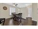 Dining room area with stylish table, ceiling fan, and natural light at 2050 W Warm Springs Rd # 823, Henderson, NV 89014