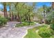Lush landscaping and a well-maintained driveway enhance the curb appeal of this home at 2050 W Warm Springs Rd # 823, Henderson, NV 89014