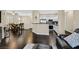 Spacious living area showcasing open floor plan with dining and kitchen areas at 2050 W Warm Springs Rd # 823, Henderson, NV 89014