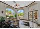 Elegant community lobby with large windows, comfortable seating, and views of the lush landscaping at 2050 W Warm Springs Rd # 823, Henderson, NV 89014