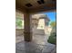 Spacious back patio featuring decorative stone flooring and covered area at 2138 Grand Traverse St, Henderson, NV 89052