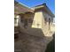 Inviting back patio with decorative wall art and access to the home at 2138 Grand Traverse St, Henderson, NV 89052