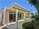Covered patio extending from the sunroom, offering an outdoor living space at 2138 Grand Traverse St, Henderson, NV 89052