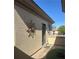 Exterior view with door, wall art, and well-maintained stucco at 2138 Grand Traverse St, Henderson, NV 89052