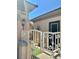 Exterior view shows a charming entryway with a gated porch and desert landscape at 2138 Grand Traverse St, Henderson, NV 89052