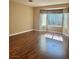 Bright living room featuring hardwood floors and a bay window at 2138 Grand Traverse St, Henderson, NV 89052