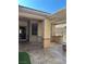 Covered outdoor patio with stamped concrete flooring and space for outdoor seating at 2138 Grand Traverse St, Henderson, NV 89052