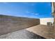 Private backyard with a block wall and a paved patio area at 226 White Crest Peak Ave, Henderson, NV 89015