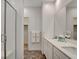 Bathroom boasting a double sink vanity and glass enclosed shower at 226 White Crest Peak Ave, Henderson, NV 89015