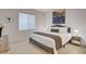 Inviting bedroom featuring soft lighting, a comfortable bed, and contemporary decor at 226 White Crest Peak Ave, Henderson, NV 89015