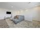 Relaxing living room is ready for move-in with plush seating and neutral tones for a calming atmosphere at 226 White Crest Peak Ave, Henderson, NV 89015
