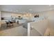 Open-concept living space featuring a kitchen, living room, and dining area with modern finishes at 226 White Crest Peak Ave, Henderson, NV 89015