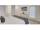 Modern bedroom with dresser and tv, offering comfort and convenience at 226 White Crest Peak Ave, Henderson, NV 89015