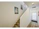 A staircase with carpet and access to the outside at 226 White Crest Peak Ave, Henderson, NV 89015