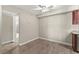 Bright room with wood floors leading to bathroom with tub and shower at 2606 S Durango Dr # 245, Las Vegas, NV 89117