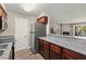 Kitchen area with granite countertops and stainless steel refrigerator at 2606 S Durango Dr # 245, Las Vegas, NV 89117