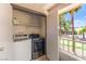 Laundry room in outdoor storage area with modern washer and dryer for in-unit convenience at 2606 S Durango Dr # 245, Las Vegas, NV 89117