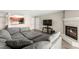 Comfortable living room featuring a fireplace and an open-concept design at 2606 S Durango Dr # 245, Las Vegas, NV 89117