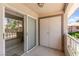 Outdoor patio with sliding glass door leading to an open space, with a storage area for convenience at 2606 S Durango Dr # 245, Las Vegas, NV 89117