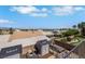 Backyard view showcasing sheds, landscaping, and the surrounding neighborhood at 2684 Korea Ct, Henderson, NV 89052