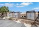 Fenced backyard features multiple storage sheds, offering ample outdoor storage space at 2684 Korea Ct, Henderson, NV 89052