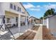 Spacious backyard with a covered patio and storage shed, perfect for outdoor living at 2684 Korea Ct, Henderson, NV 89052