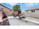 Backyard patio with outdoor furniture, firepit, and storage shed, an inviting space for relaxation at 2684 Korea Ct, Henderson, NV 89052
