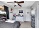 Bedroom with neutral carpet, ceiling fan, closet, and a window providing natural light at 2684 Korea Ct, Henderson, NV 89052