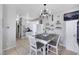 Charming dining area with a modern chandelier, and stylish decor at 2684 Korea Ct, Henderson, NV 89052