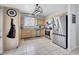 Bright kitchen with light wood cabinets, stainless steel appliances, and an adjacent dining space at 2684 Korea Ct, Henderson, NV 89052