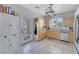 Clean kitchen with stainless steel appliances, ample counter space, and backyard access at 2684 Korea Ct, Henderson, NV 89052