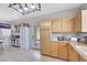 Bright eat-in kitchen area with light wood cabinets, tile floors, and stainless steel appliances at 2684 Korea Ct, Henderson, NV 89052