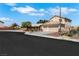 A comfortable two-story home with desert landscaping sits at the end of a cul-de-sac at 2684 Korea Ct, Henderson, NV 89052